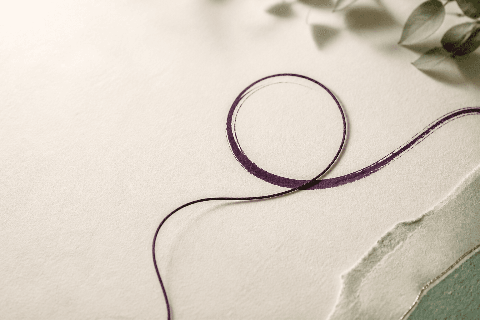 A quiet loop line opening across textured paper